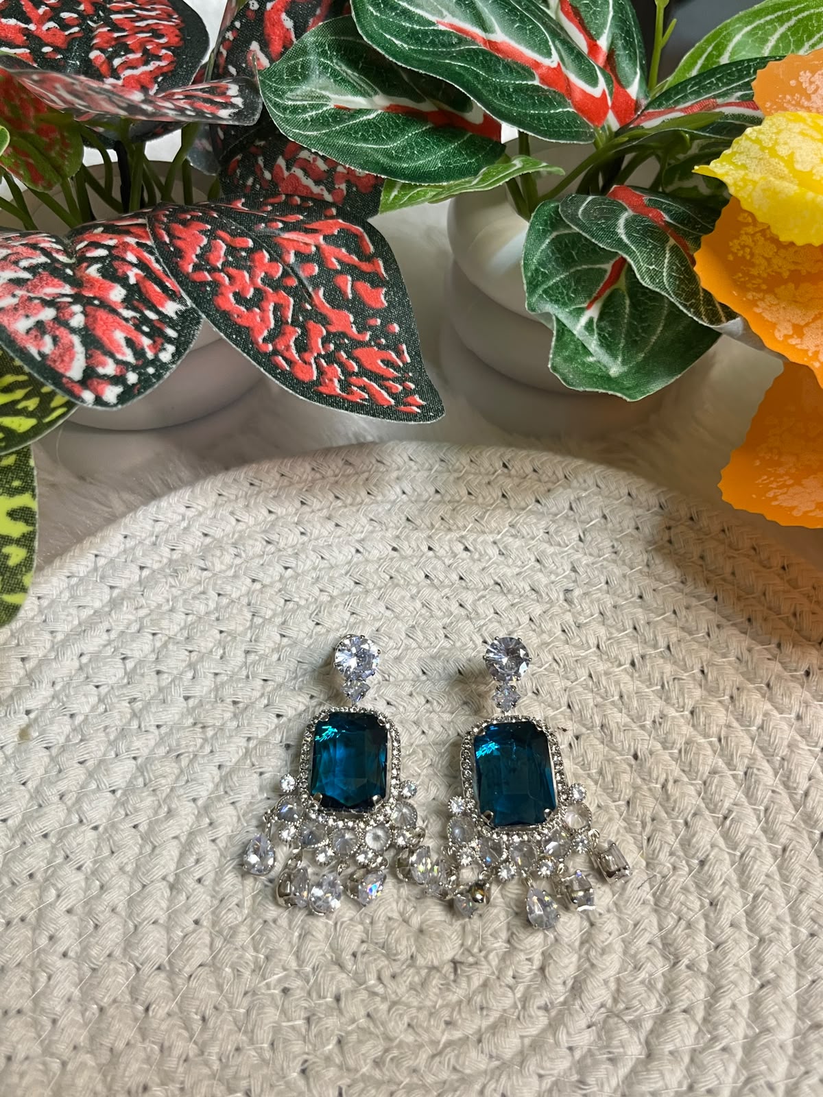 Deep teal-blue statement chandelier earrings
